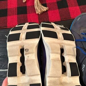 Nice!! Used in Great condition. Purple with neon green laces.